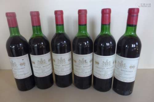 Six bottles of Chateau Moulinet Pomerol 1969 red wine, four with level to base of neck, two others