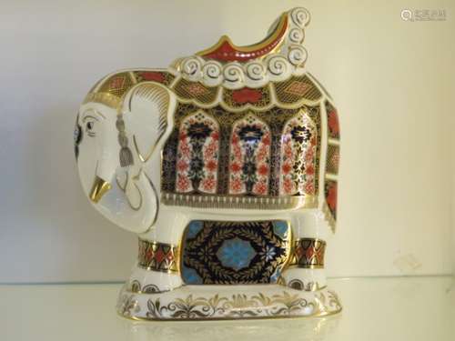 A large Crown Derby elephant paperweight with silver seal, Imari pattern, height 21cm - in good