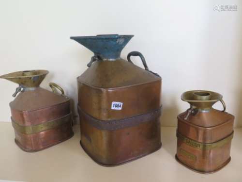 Three graduating copper and brass measures 1/2 gallons Chekpump Burgh of Airdrie