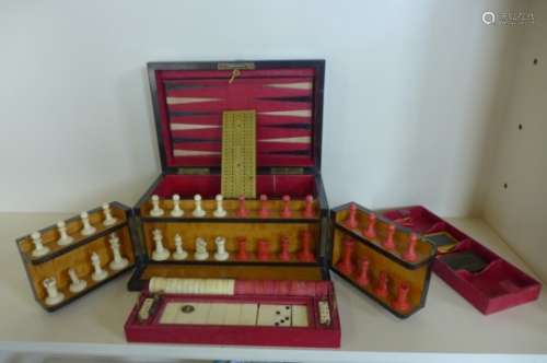 A Victorian Coromandel travel games compendium, the Royal cabinet of games with bone chest set,