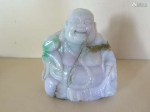 A lavender jade laughing Buddha, 9cm tall, in good condition