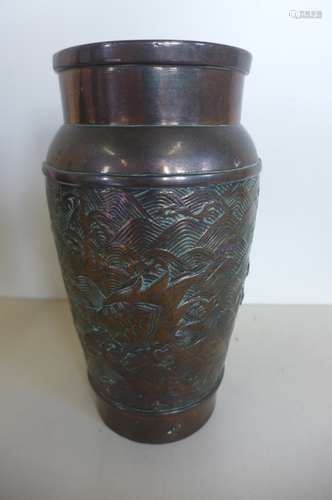 An oriental bronze vase, decorated with terrapin turtles in waves, 23cm tall, minor bending to