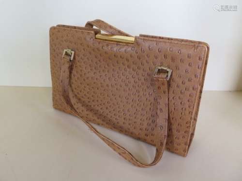 An ostrich skin handbag, 32cm wide, some wear, generally good condition