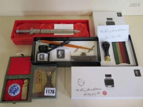 An unused calligraphy set by penny black and three seal sets and a paper knife