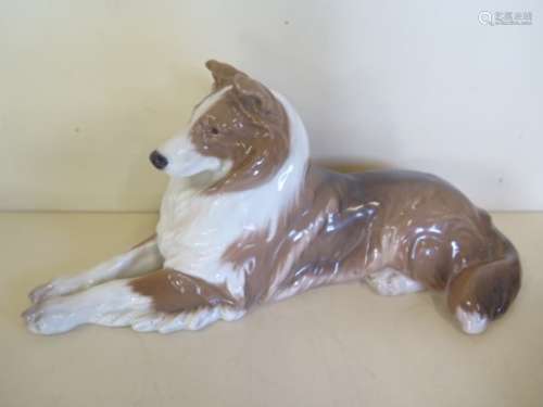 A Royal Copenhagen China Collie reference No 1701 - designer Peter Herold, height 22cm, date stamped