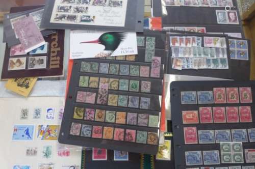 An eclectic collection of world stamps ? including commonwealth and GB ? on small and large stock-