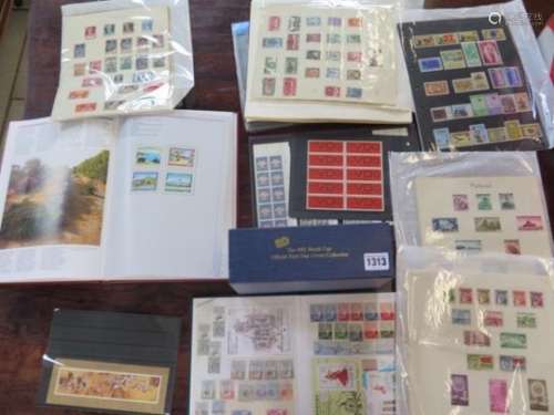 An interesting collection of foreign stamps on stock-cards, album pages and a stock-book to