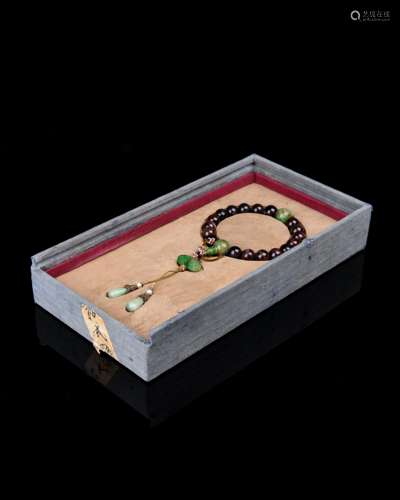 A Chinese Carved Tourmaline Prayers Beads