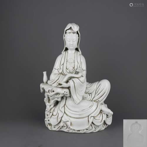 A Chinese White Glazed Porcelain Buddha