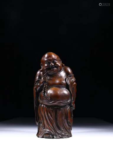 A Chinese Carved Bamboo Figure of Buddha