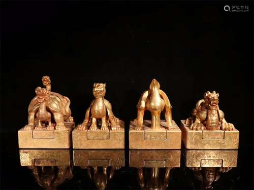 A Set of Four Chinese Gilt Bronze Seals