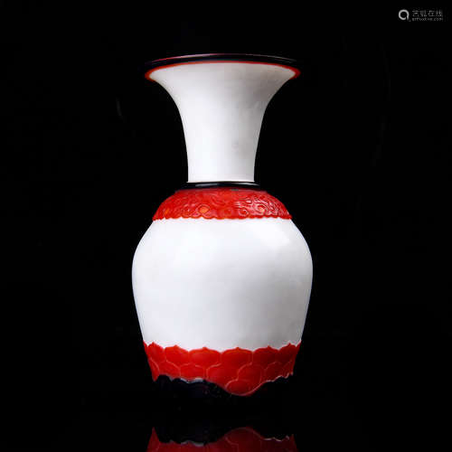 A Chinese Carved Red and White Peking Glass