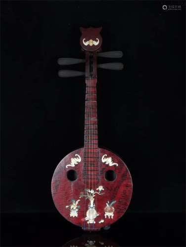 A Chinese Carved Lacquer Lute