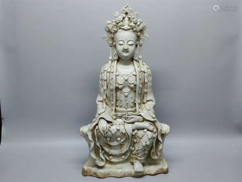 A Chinese White Glazed Porcelain Buddha
