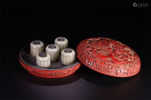 A Set of Chinese Carved Jade Ring with Carved Tixi Lacquer Box with Cover