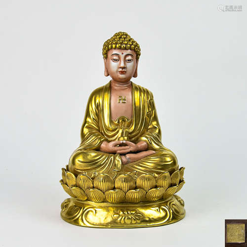 A Chinese Gilt Porcelain Buddha