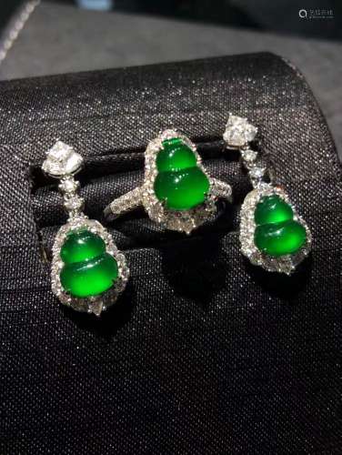 A Set of Chinese Carved Jadeite Ring and Earring