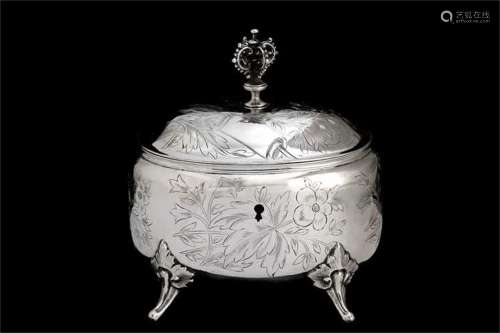 An Austria Carved Silver Tea Can with Cover