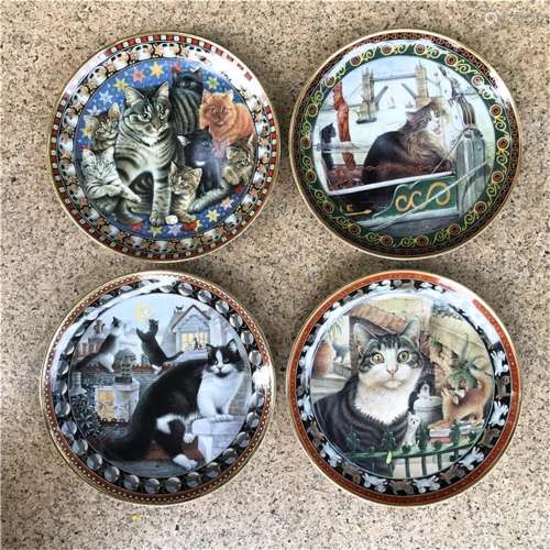 A Set of Four Porcelain Plates