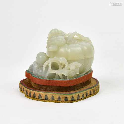 A Chinese Carved Jade Box with Cover