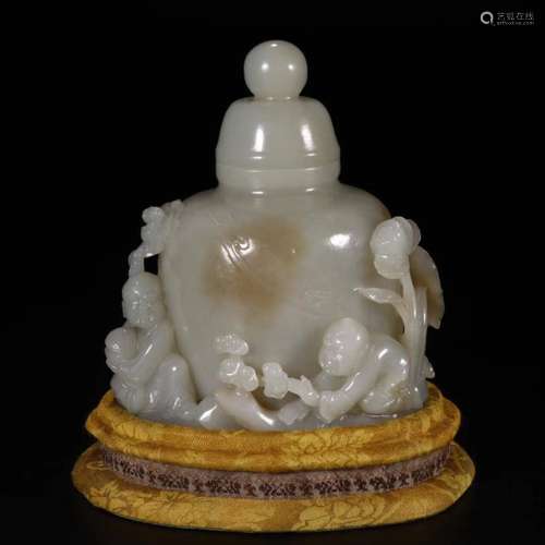 A Chinese Carved Jade Jar with Cover