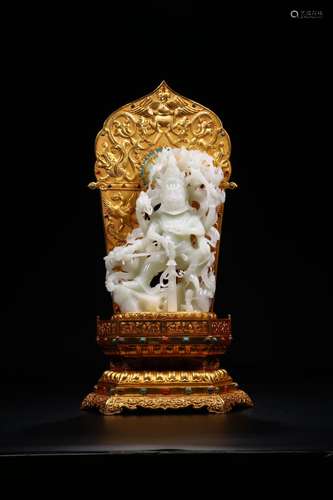 A Chinese Carved Jade Buddha with Gilt Bronze Stand