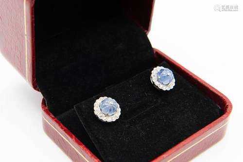 A PAIR OF SAPPHIRE AND DIAMOND EARRINGS, the carved