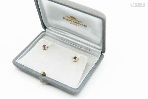 A PAIR OF RUBY AND DIAMOND STUD EARRINGS BY MAPPIN AND