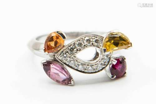 AN 18CT WHITE GOLD AND MULTI GEM SET RING BY CARTIER,