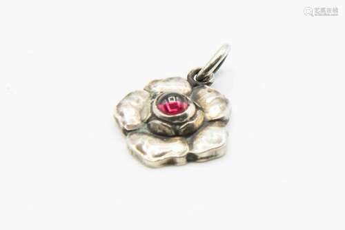 A SILVER PENDANT BY GEORG JENSEN, the simple flower