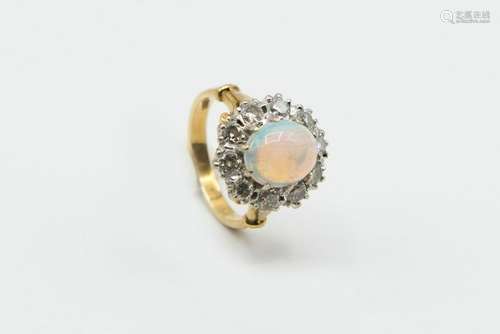 AN OPAL AND DIAMOND CLUSTER RING, circa 1890-1900, the