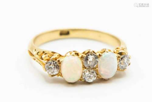 A LATE VICTORIAN OPAL AND DIAMOND RING, the two oval