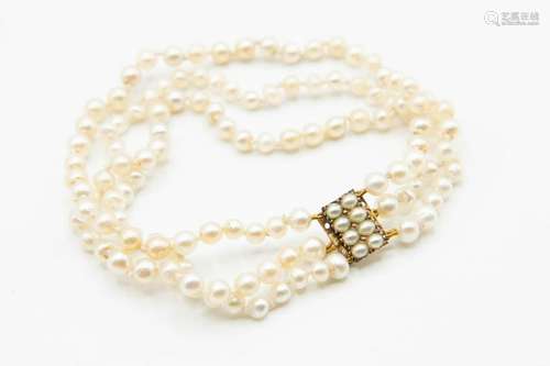 A SEED PEARL BRACELET, the rows of uniform seed pearls