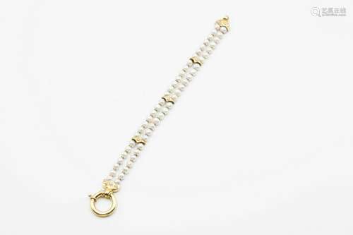 A CONTEMPORARY CULTURED PEARL AND DIAMOND BRACELET, the