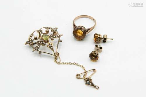 AN ART NOUVEAU 9CT GOLD, PERIDOT AND SEED PEARL PENDANT