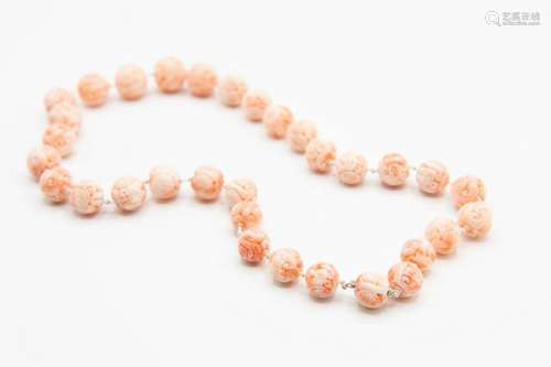 A CHINESE CORAL NECKLACE, the thirty two graduating