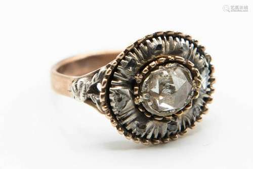 A GEORGIAN DIAMOND RING, the oval mount set to the