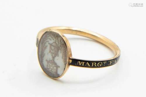 A GEORGIAN MEMORIAL RING, the oval mount with pencil