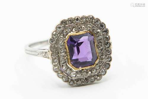 AN AMETHYST AND DIAMOND SET DRESS RING, the fancy cut