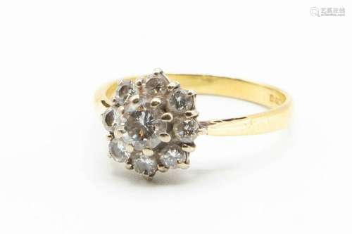 AN 18CT YELLOW GOLD AND DIAMOND RING, the principal