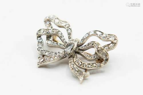 AN EARLY VICTORIAN DIAMOND SET BOW BROOCH, the double