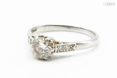 A PLATINUM AND DIAMOND RING, the brilliant cut diamond