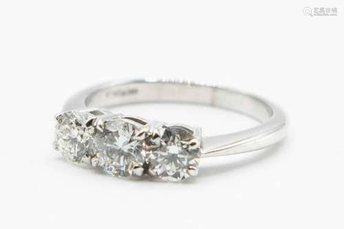 AN 18CT WHITE GOLD AND DIAMOND RING, the three