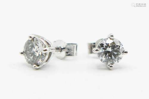 A PAIR OF DIAMOND STUD EARRINGS, each brilliant cut