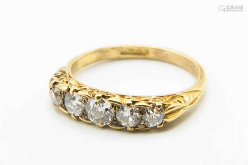 A LATE VICTORIAN DIAMOND SET RING, the five graduating