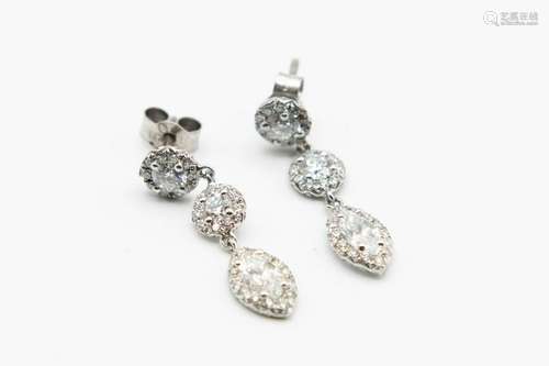 A PAIR OF DIAMOND SET EARRINGS, of three principal