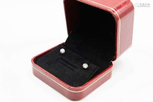 A PAIR OF DIAMOND STUD EARRINGS, the single old