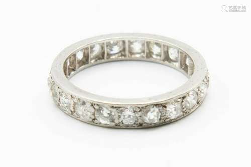 A DIAMOND ETERNITY RING, brilliant cut diamonds set