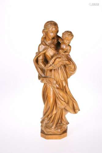 A CARVED BEECH FIGURE OF MADONNA AND CHILD, c.1930, she