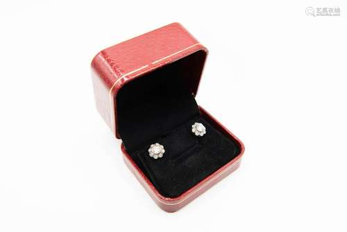 A PAIR OF DIAMOND STUD EARRINGS, set to the centre with